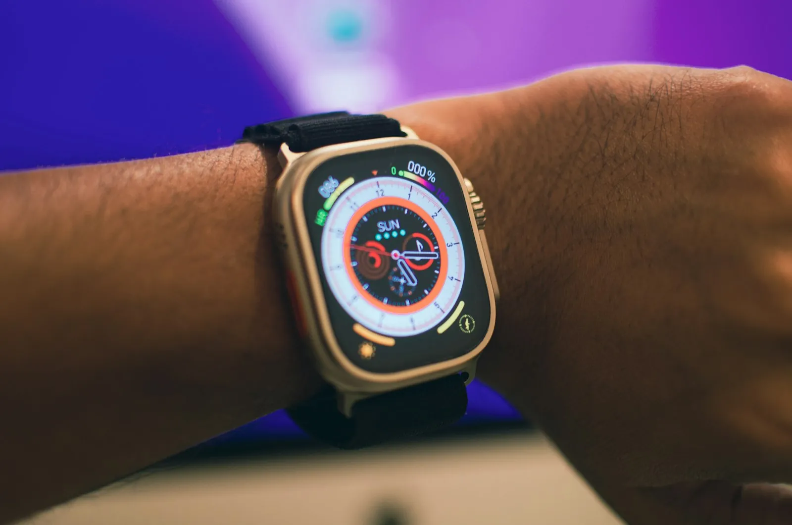 A smartwatch worn on a person's left wrist