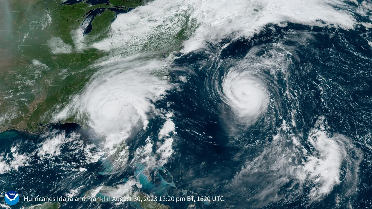 A GOES-16 satellite image of Hurricane Idalia reaching Florida while Hurricane Franklin passes Bermuda