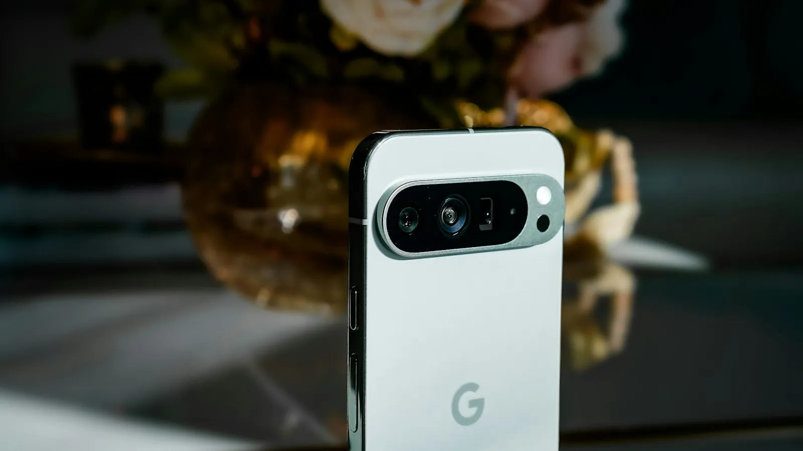 The back of a white Google Pixel phone with its camera lenses in a row