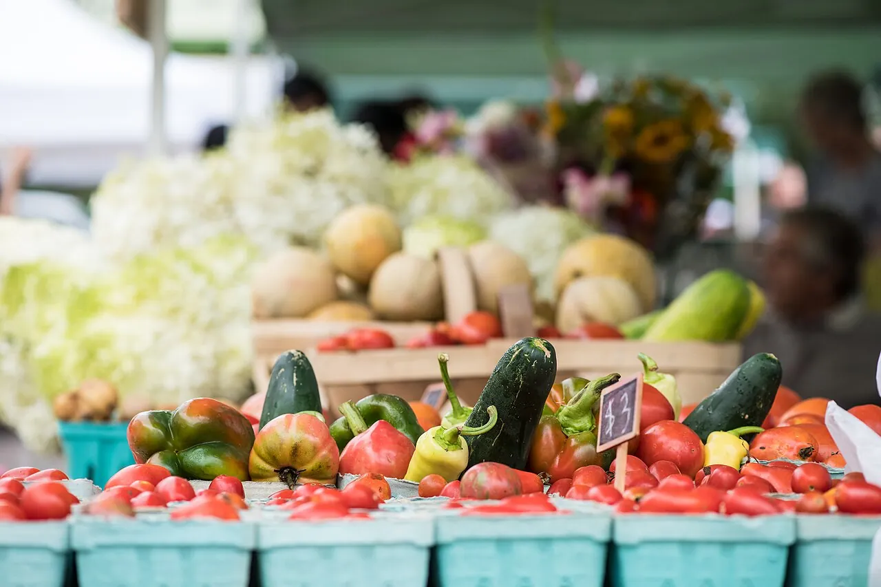 Fresh produce and flowers for sale at a farmers market in Washington, D.C.