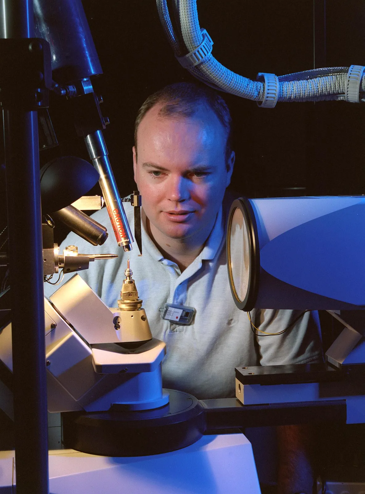 Edward Snell lines up a protein crystal for an X-ray study at NASA in 2000