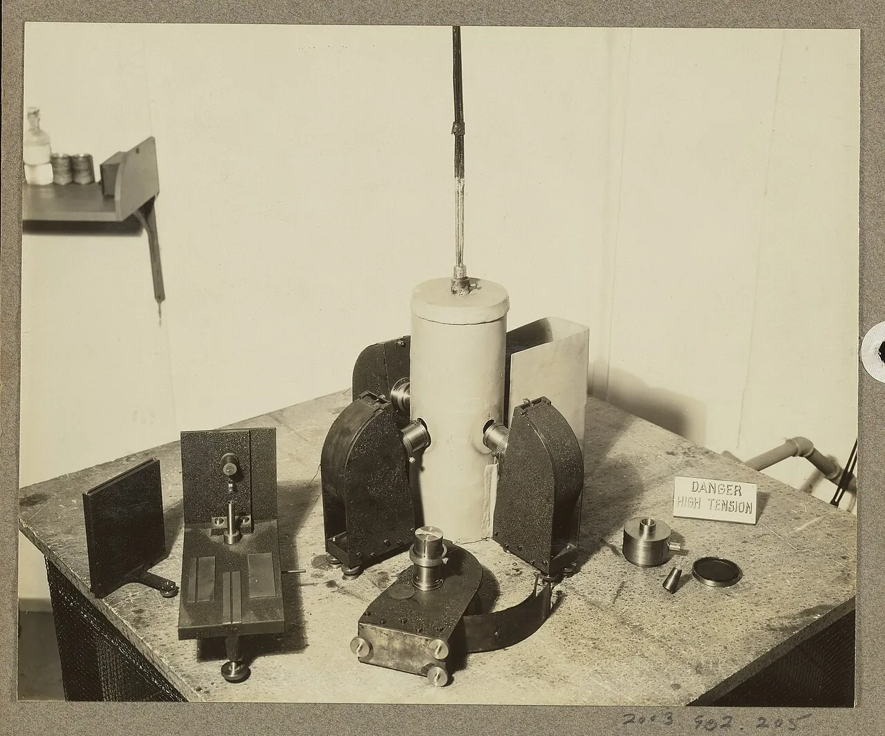 Black-and-white photo of an early lab machine for making X-ray diffraction patterns of crystals
