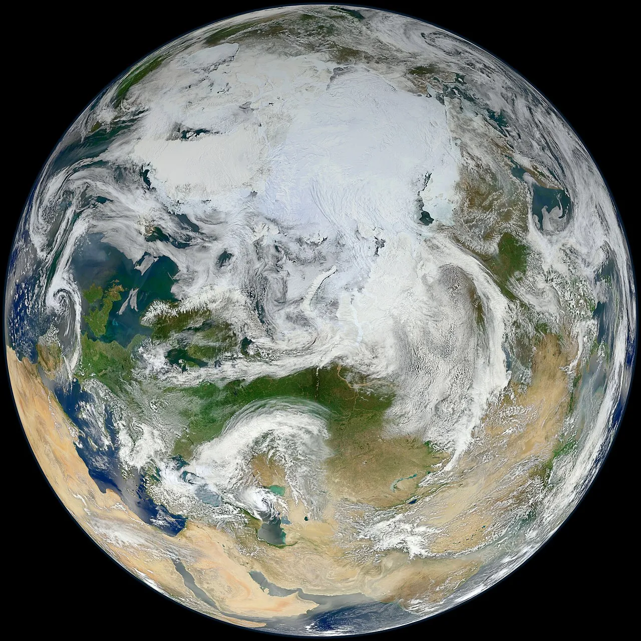 Earth seen from space above the Arctic, with Europe and Asia in view