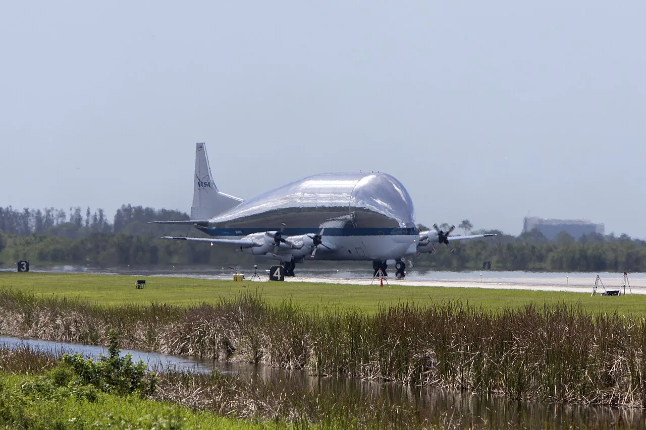 The Super Guppy comes in to land on the runway at Kennedy Space Center in Florida