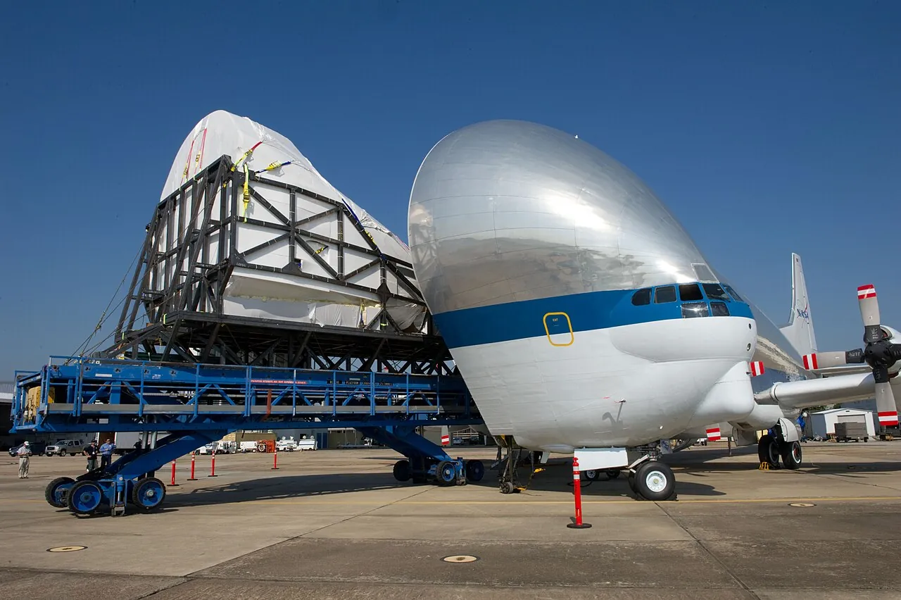 The crew cabin of a full-size space shuttle trainer is loaded into the Super Guppy at Ellington Field in Houston