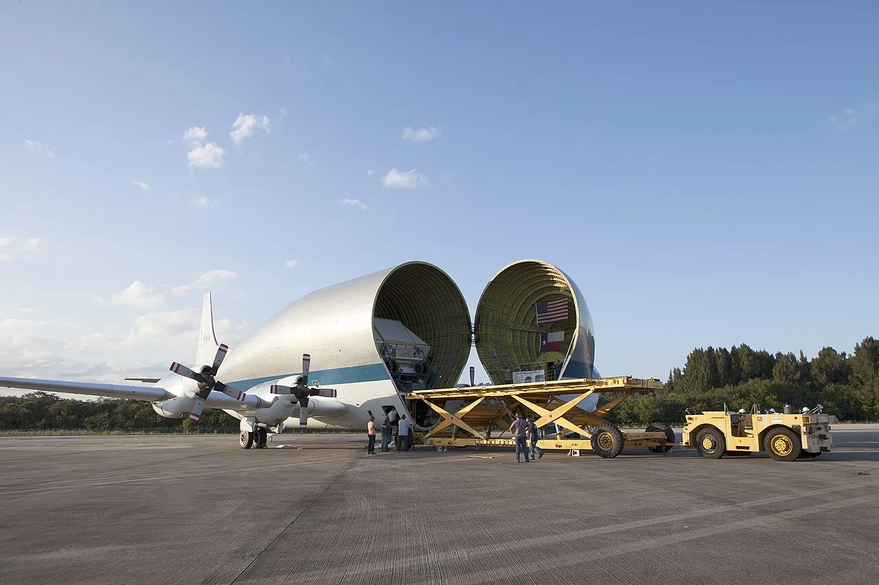 An Orion crew module pressure vessel is unloaded from the Super Guppy at Kennedy Space Center in 2016
