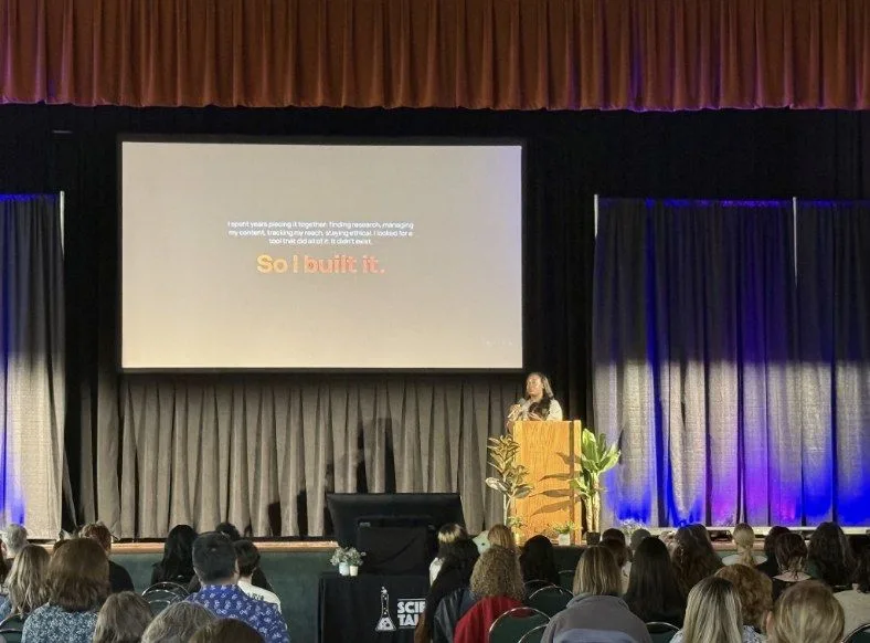 Dr. Raven giving a keynote on a big stage